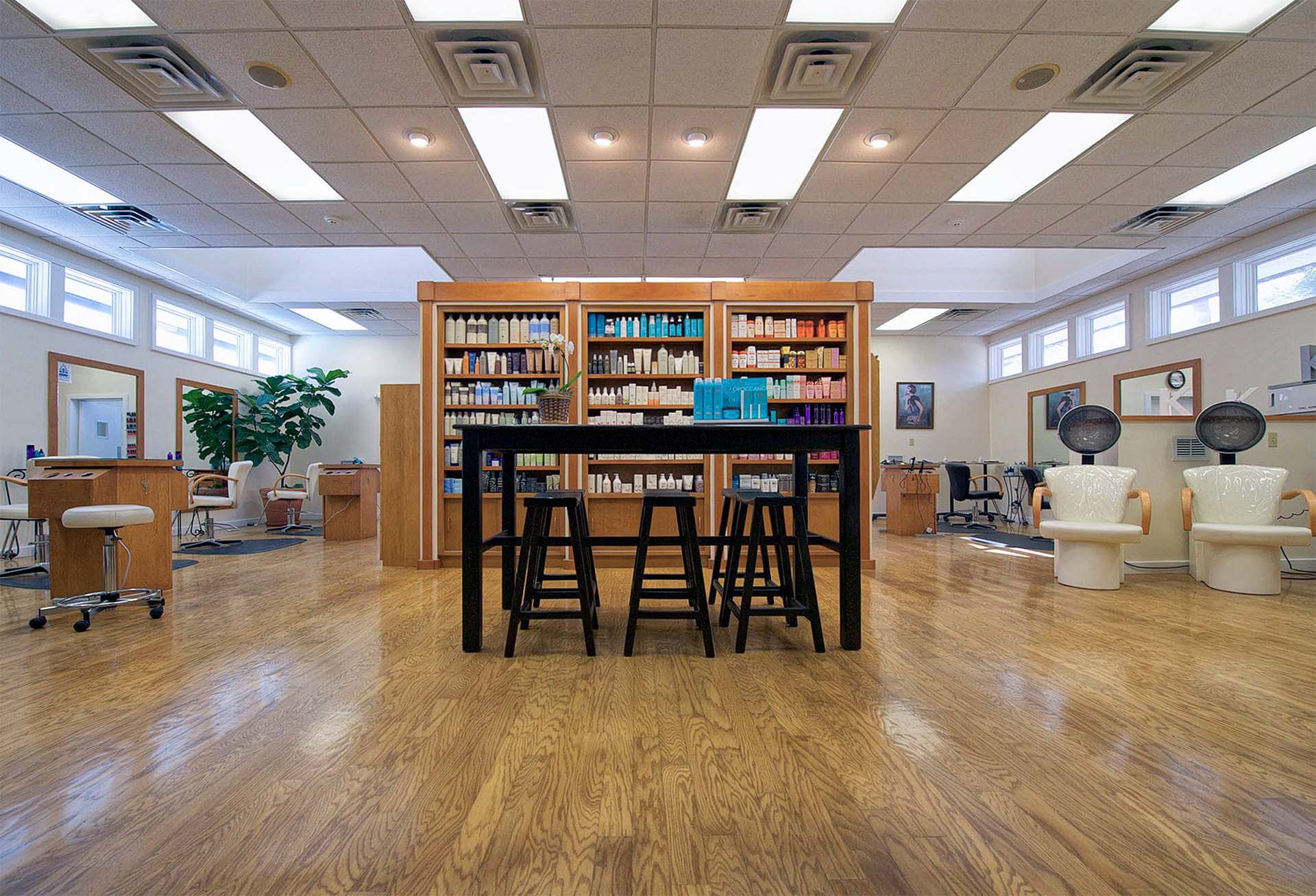 A wide shot of the spa's seating and collection of lotions