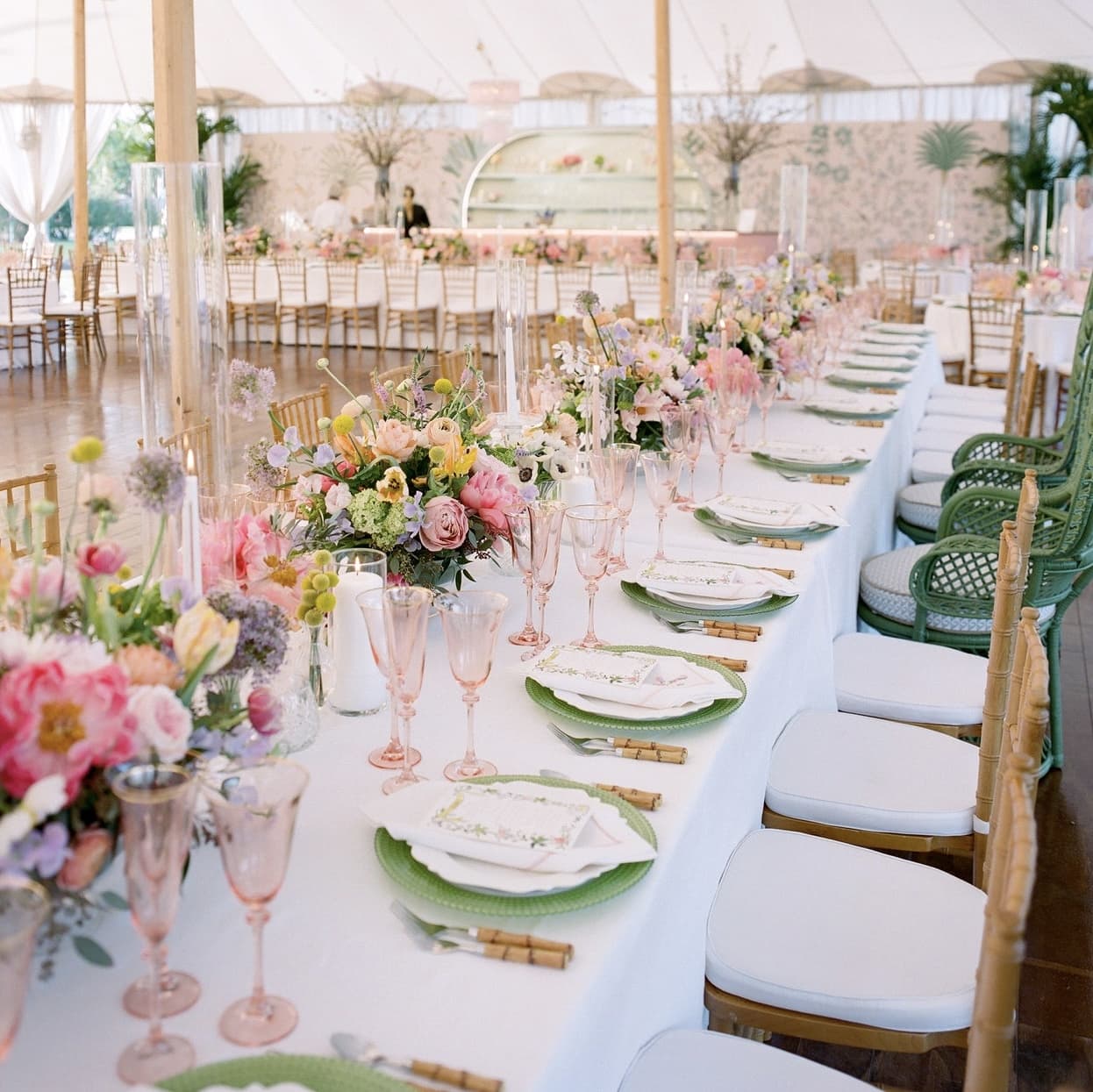 The centerpieces and place settings of a traditional wedding's great table